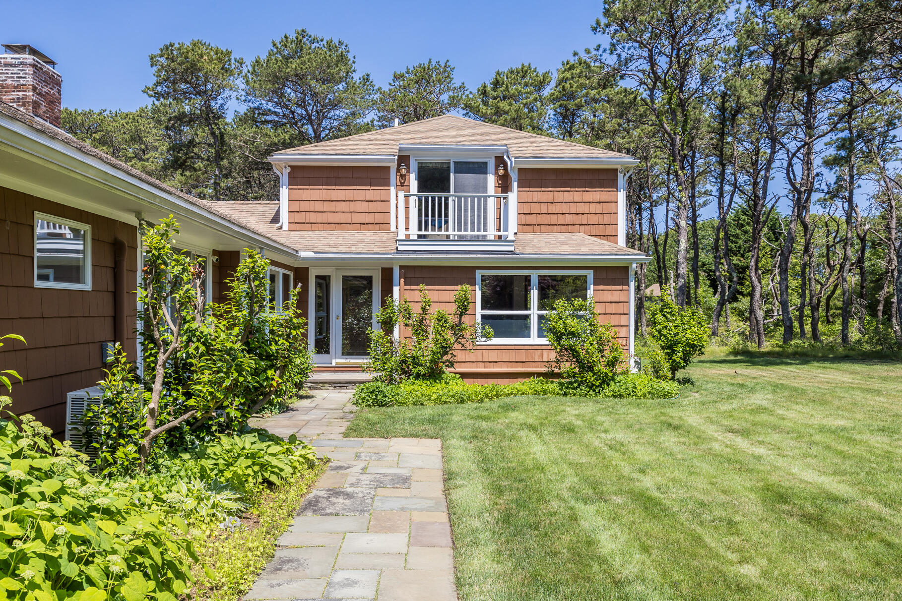72 South Highland Road Truro, MA 02666 - Photo 38 of 59 a front view of a house with a yard