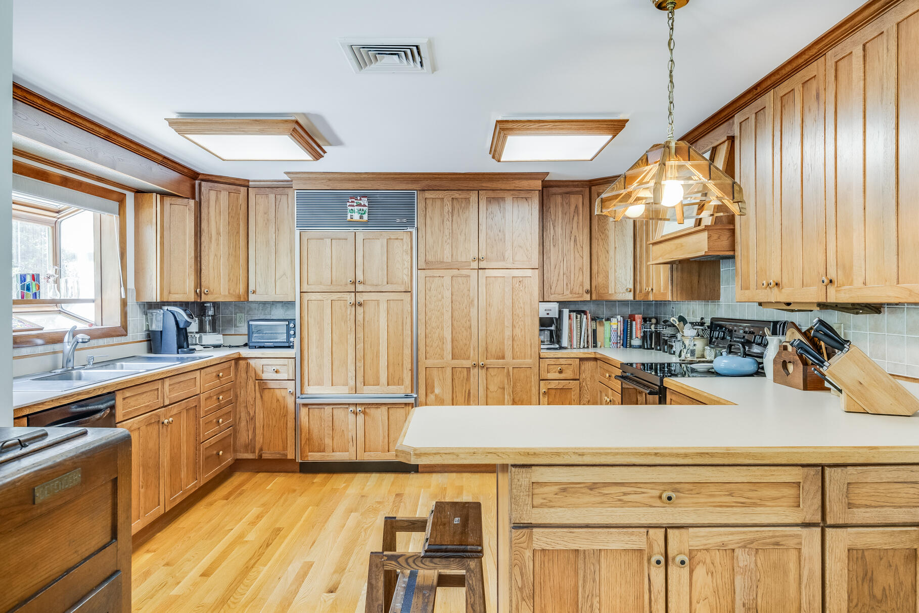 72 South Highland Road Truro, MA 02666 - Photo 4 of 59 a kitchen with stainless steel appliances kitchen island granite countertop a sink and cabinets