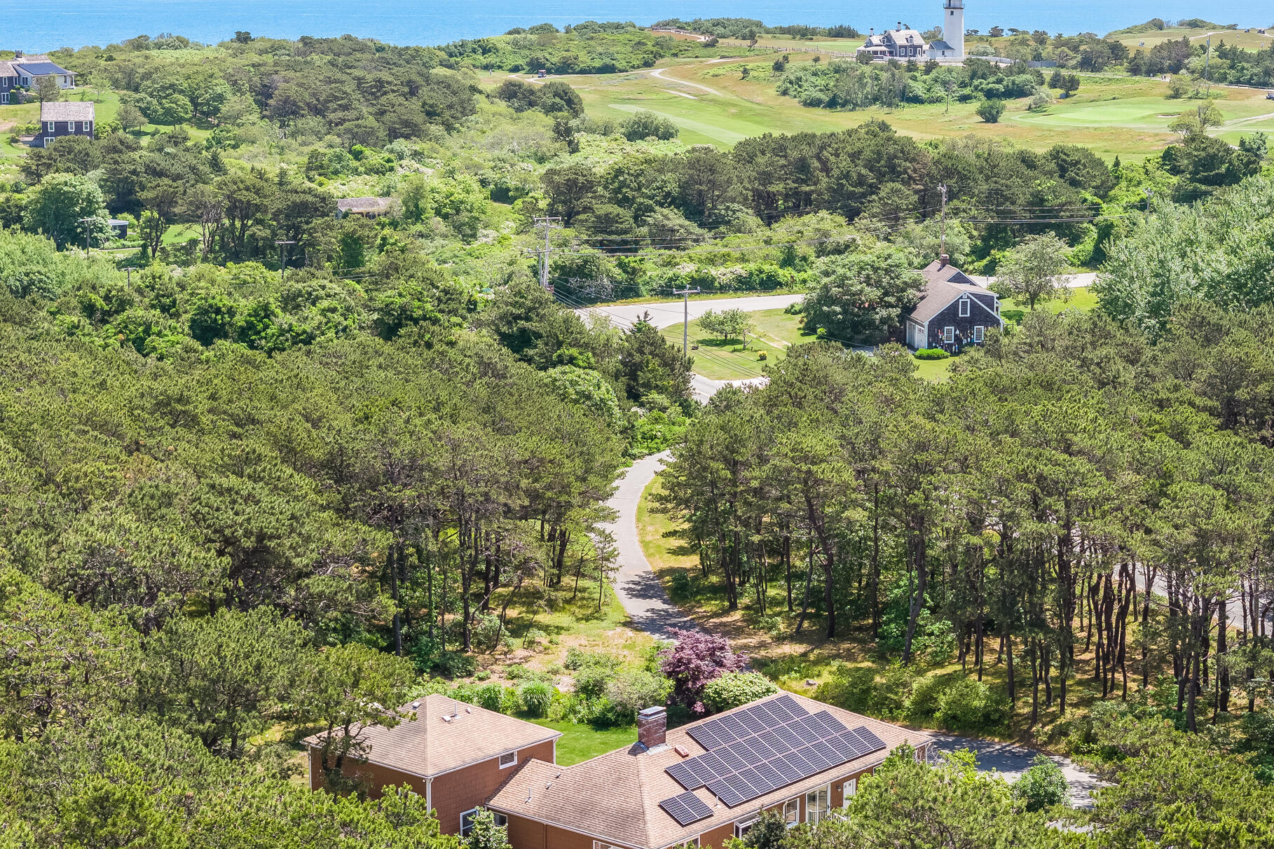 72 South Highland Road Truro, MA 02666 - Photo 48 of 59 an aerial view of residential house with outdoor space and trees all around