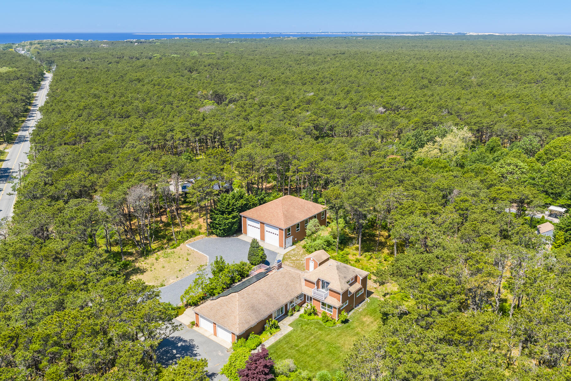 72 South Highland Road Truro, MA 02666 - Photo 49 of 59 a view of a city with an outdoor space and seating area