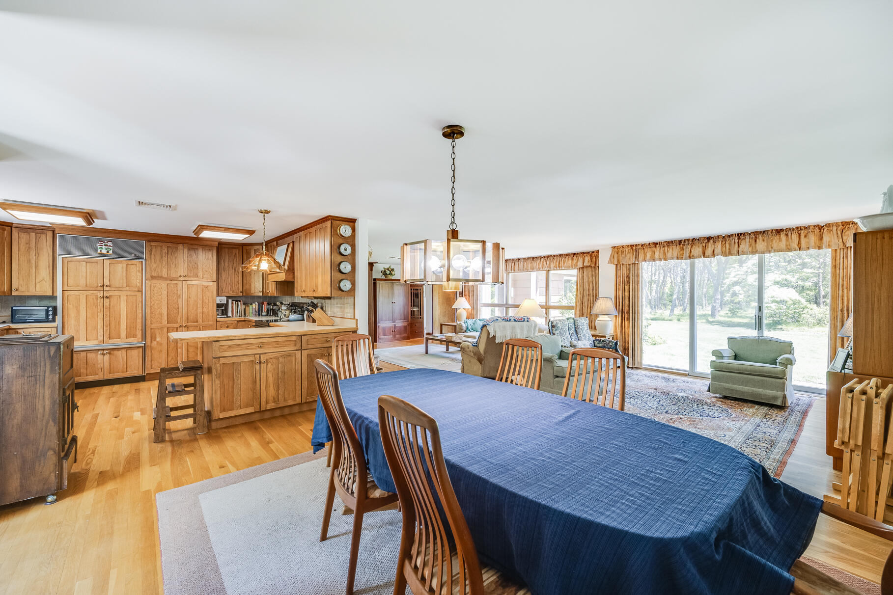 72 South Highland Road Truro, MA 02666 - Photo 8 of 59 a view of a dining room with furniture window and wooden floor