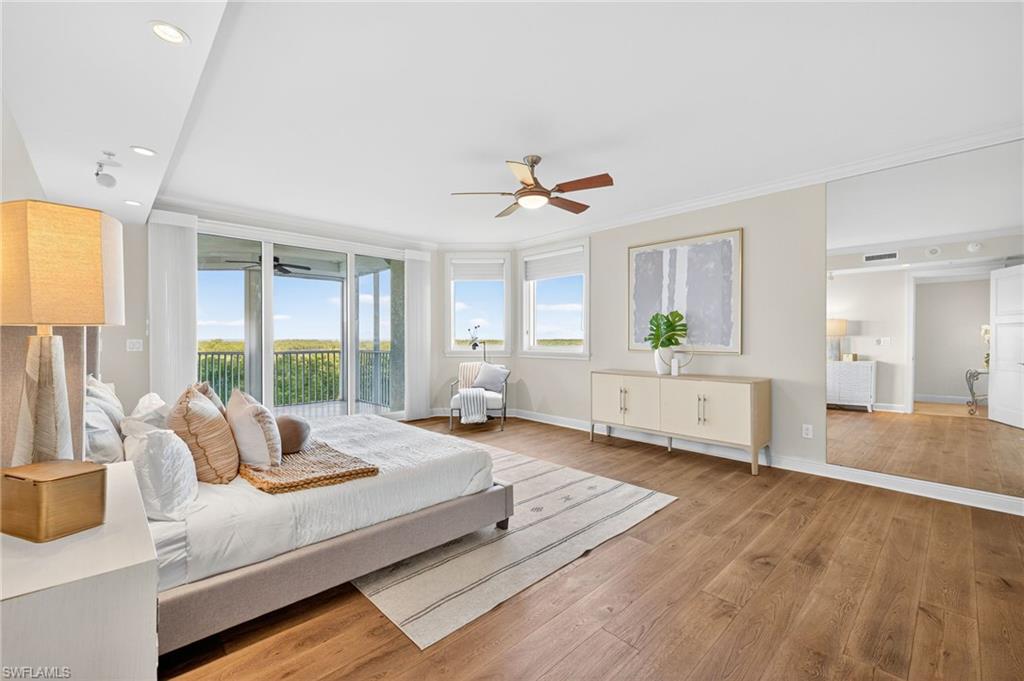 265 Indies Way, Unit 503 Naples, FL 34110 - Photo 14 of 45 Primary Suite with Views of Turkey Bay and the Gulf