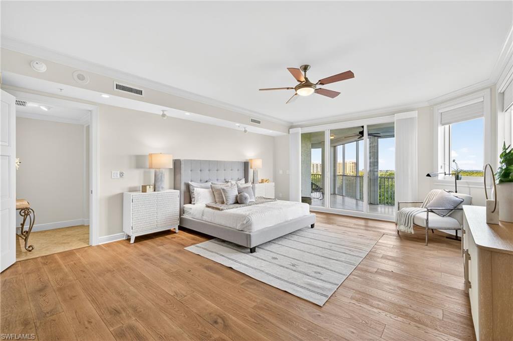 265 Indies Way, Unit 503 Naples, FL 34110 - Photo 15 of 45 Primary Suite with Beautiful Hardwood Floor