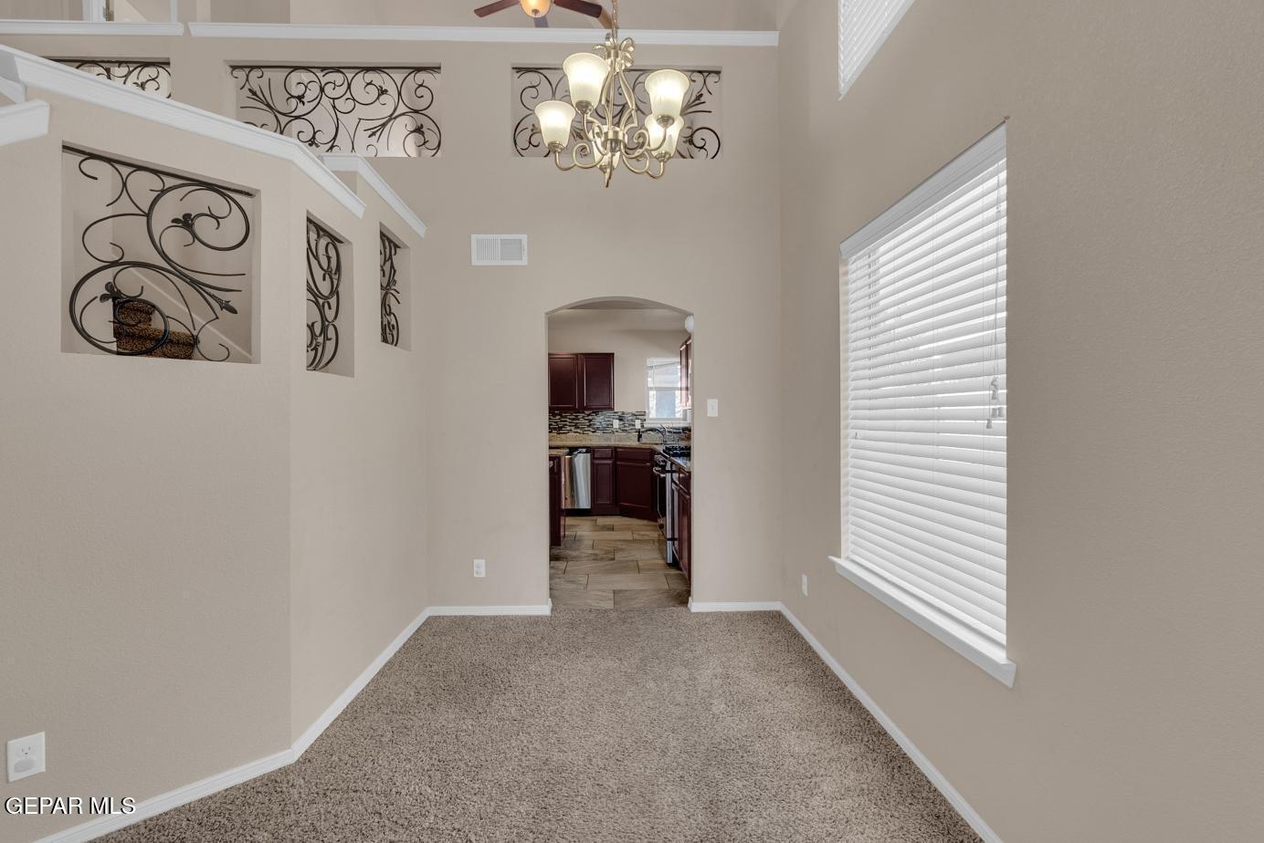 11349 West Ranch Court El Paso, TX 79934 - Photo 11 of 61 a view of an empty room with a window