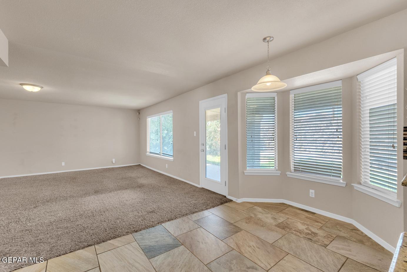 11349 West Ranch Court El Paso, TX 79934 - Photo 21 of 61 a view of an empty room with a window
