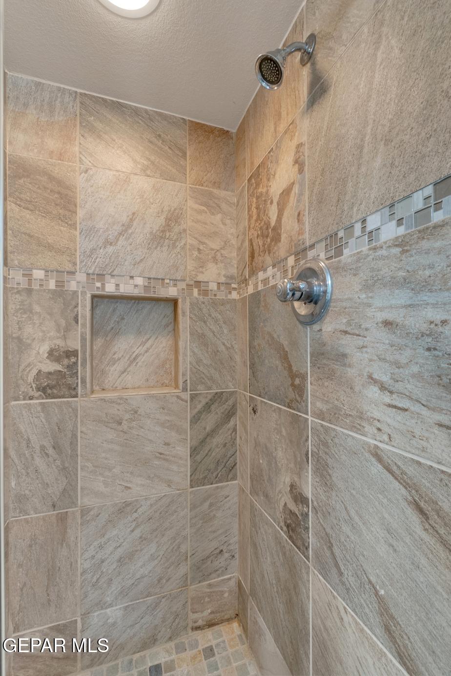 11349 West Ranch Court El Paso, TX 79934 - Photo 30 of 61 a bathroom with a shower