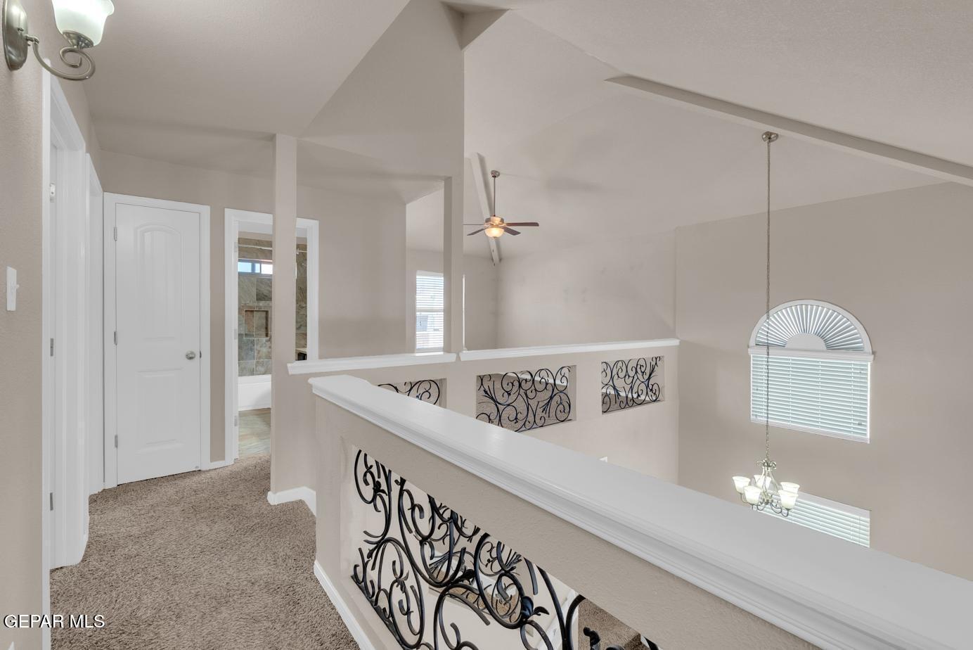 11349 West Ranch Court El Paso, TX 79934 - Photo 34 of 61 a bathroom with a sink a mirror and a shower