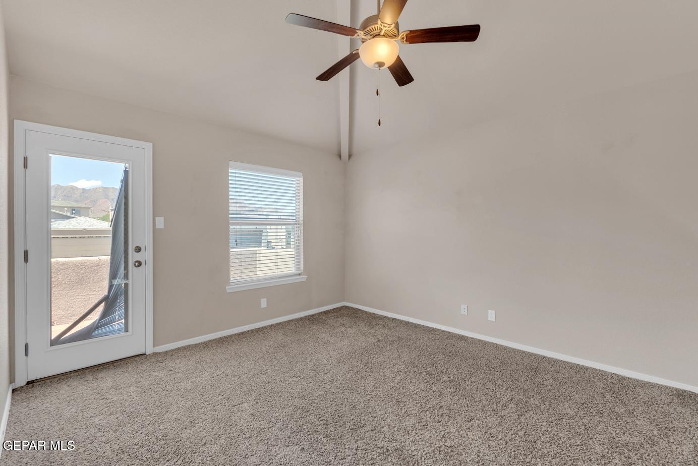 11349 West Ranch Court El Paso, TX 79934 - Photo 35 of 61 a view of room with window and ceiling fan