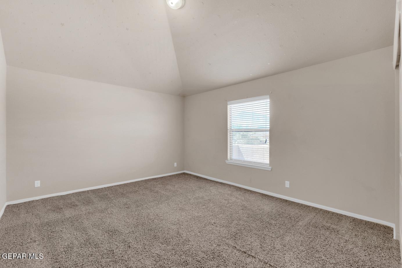 11349 West Ranch Court El Paso, TX 79934 - Photo 37 of 61 an empty room with a window