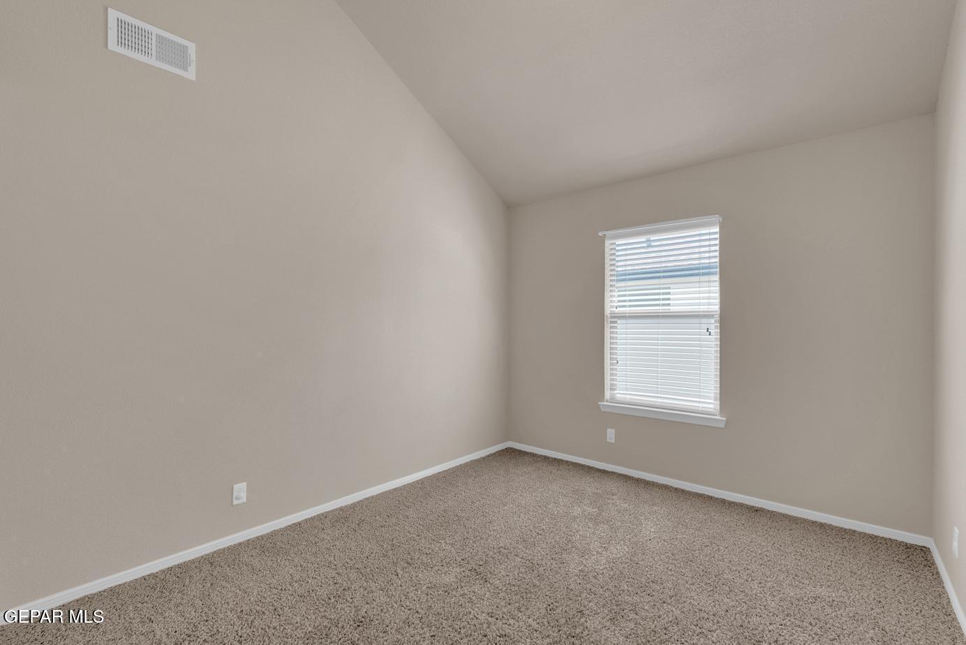 11349 West Ranch Court El Paso, TX 79934 - Photo 39 of 61 an empty room with a window