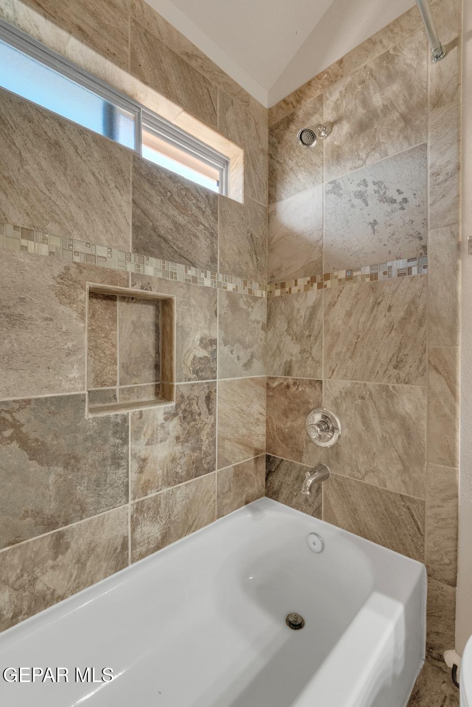 11349 West Ranch Court El Paso, TX 79934 - Photo 43 of 61 a bathroom with a bathtub