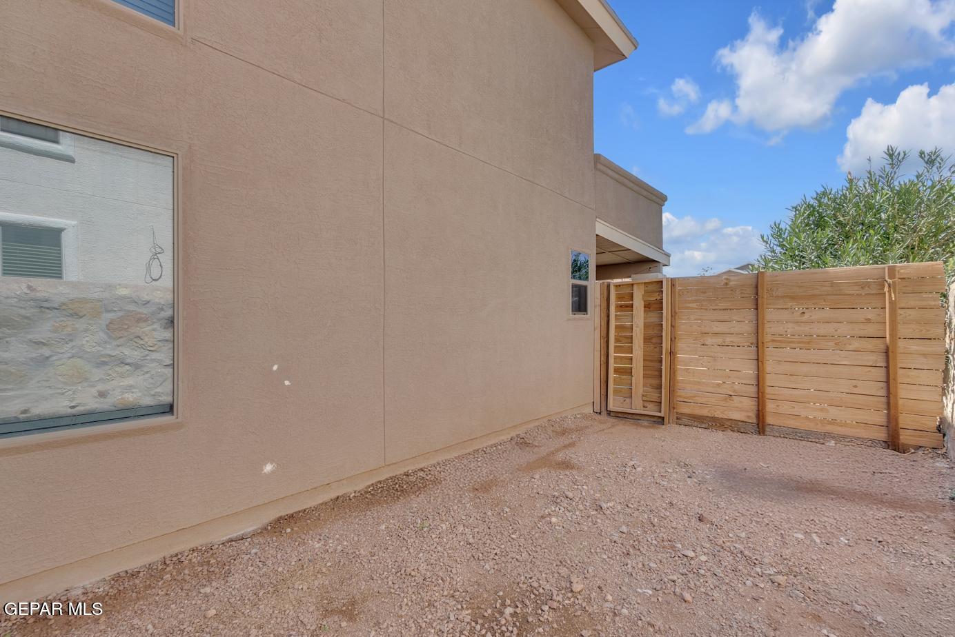 11349 West Ranch Court El Paso, TX 79934 - Photo 56 of 61 a view of an empty room with a house
