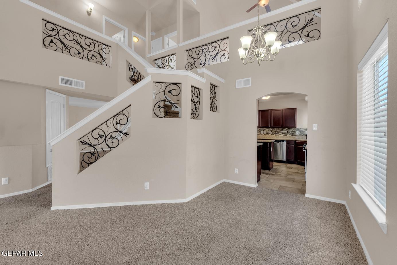 11349 West Ranch Court El Paso, TX 79934 - Photo 10 of 61 a view of a hallway with windows and closet