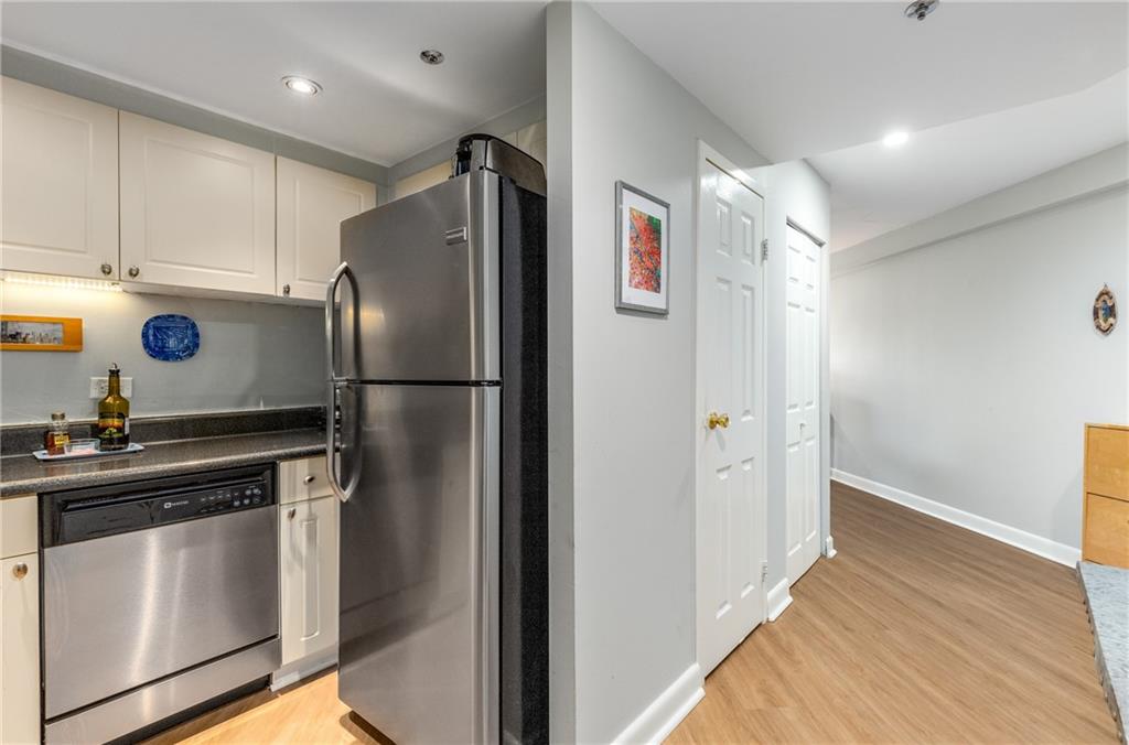 1501 Clairmont Road, Unit 535 Decatur, GA 30033 - Photo 11 of 34 a kitchen with metallic refrigerator sink and cabinets