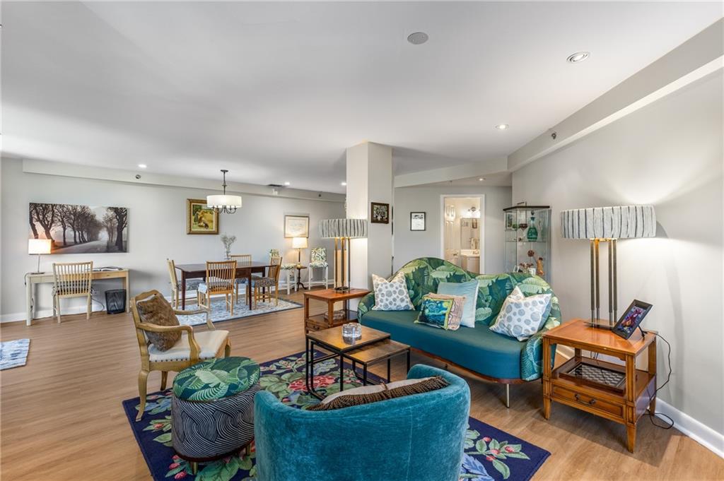 1501 Clairmont Road, Unit 535 Decatur, GA 30033 - Photo 15 of 34 a living room with furniture and a wooden floor