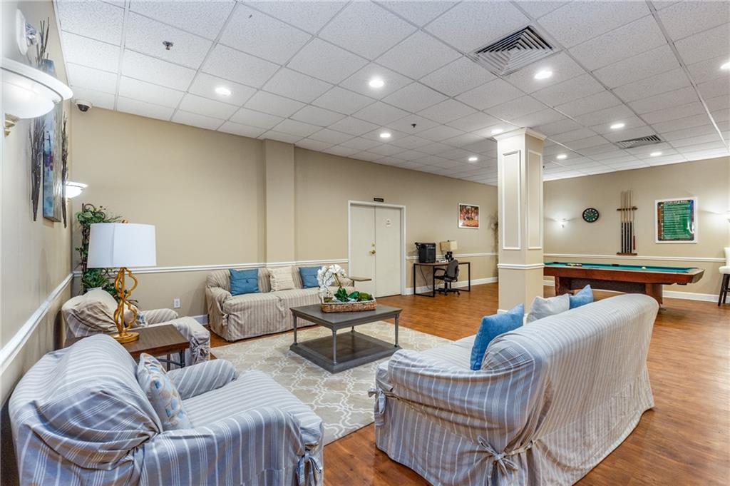 1501 Clairmont Road, Unit 535 Decatur, GA 30033 - Photo 27 of 34 a living room with furniture and a table