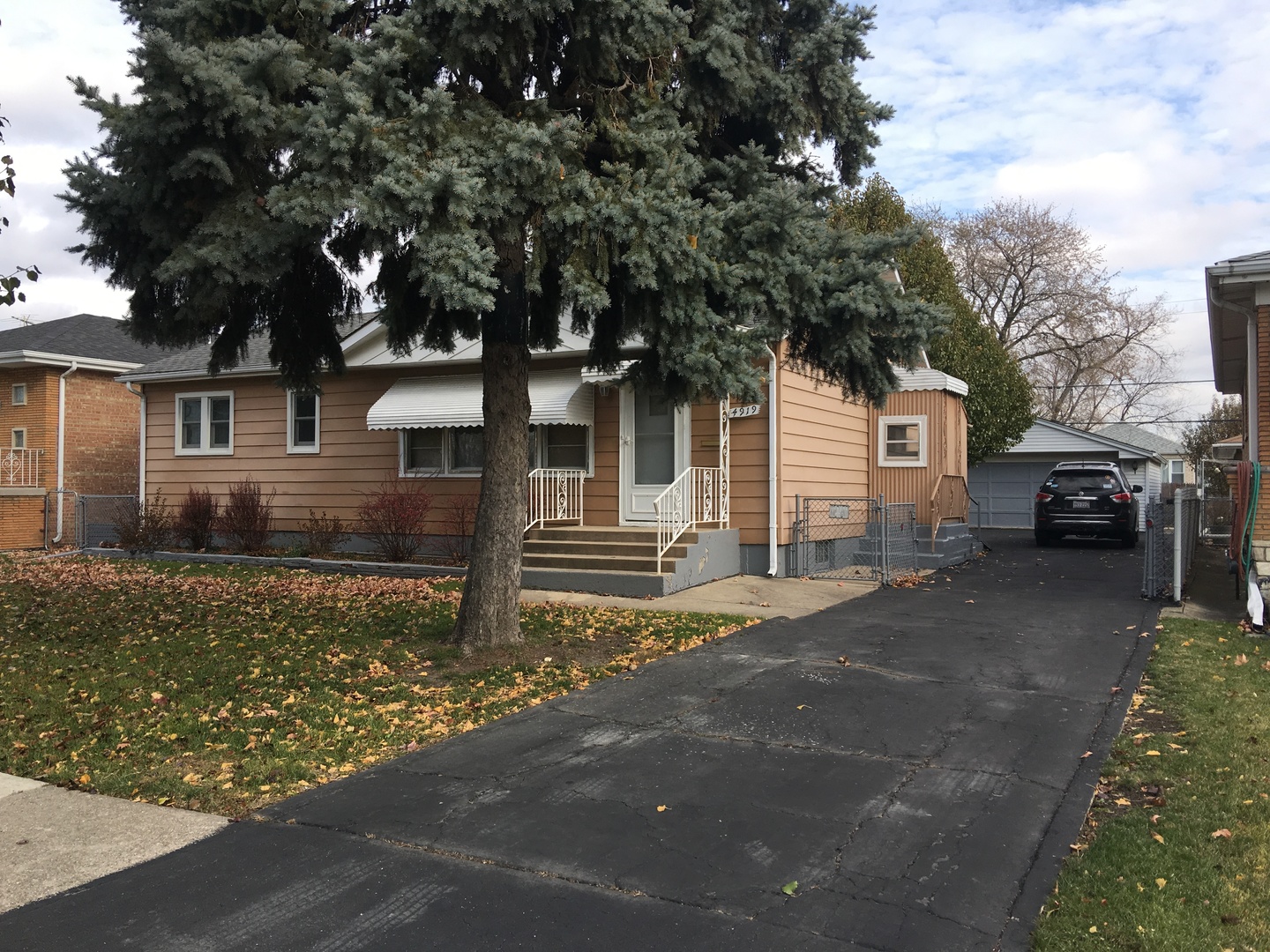 4919 Long Avenue Chicago, IL 60638 - Photo 2 of 29 a view of a house with a yard