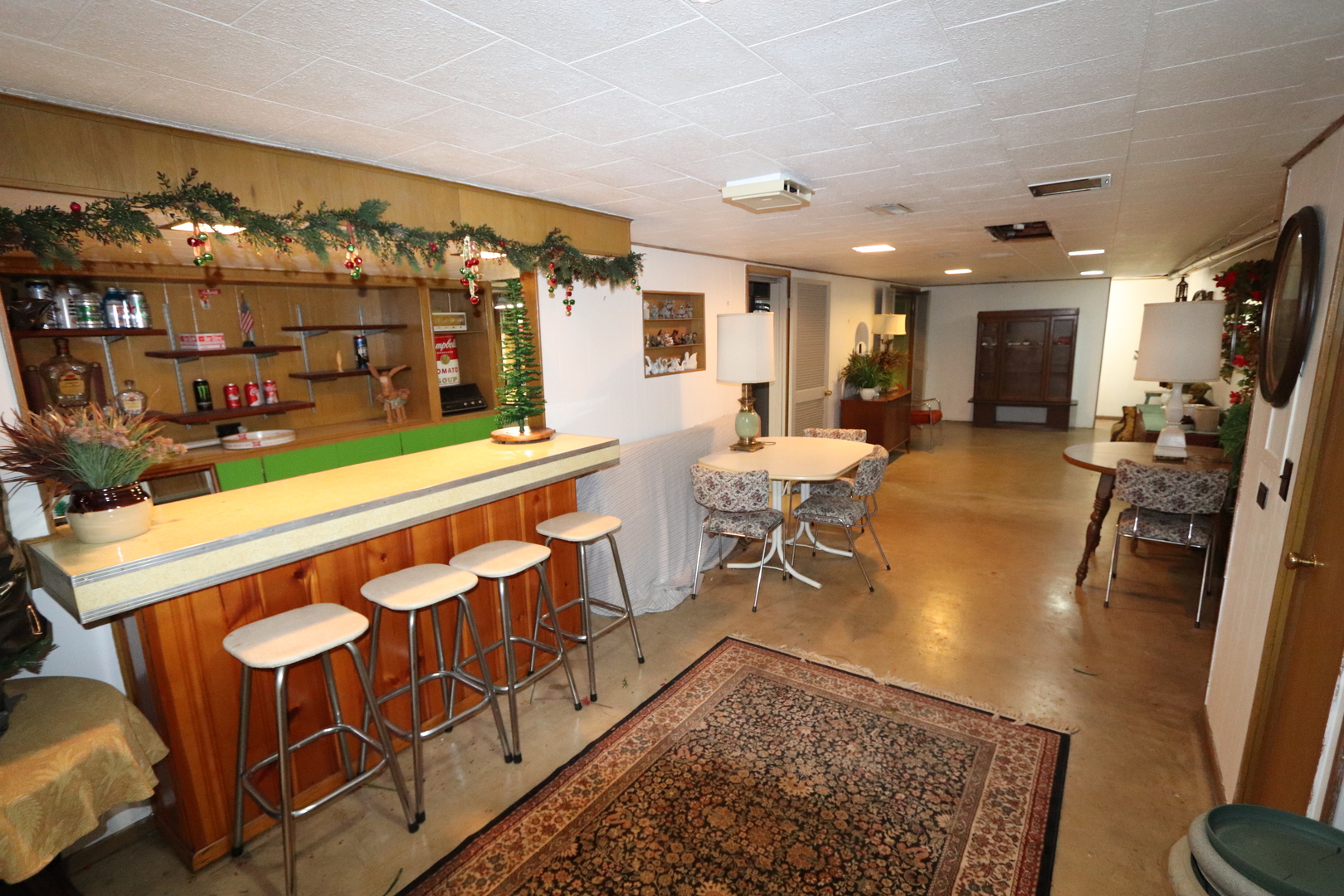 4919 Long Avenue Chicago, IL 60638 - Photo 20 of 29 a living room with furniture a rug and a fireplace