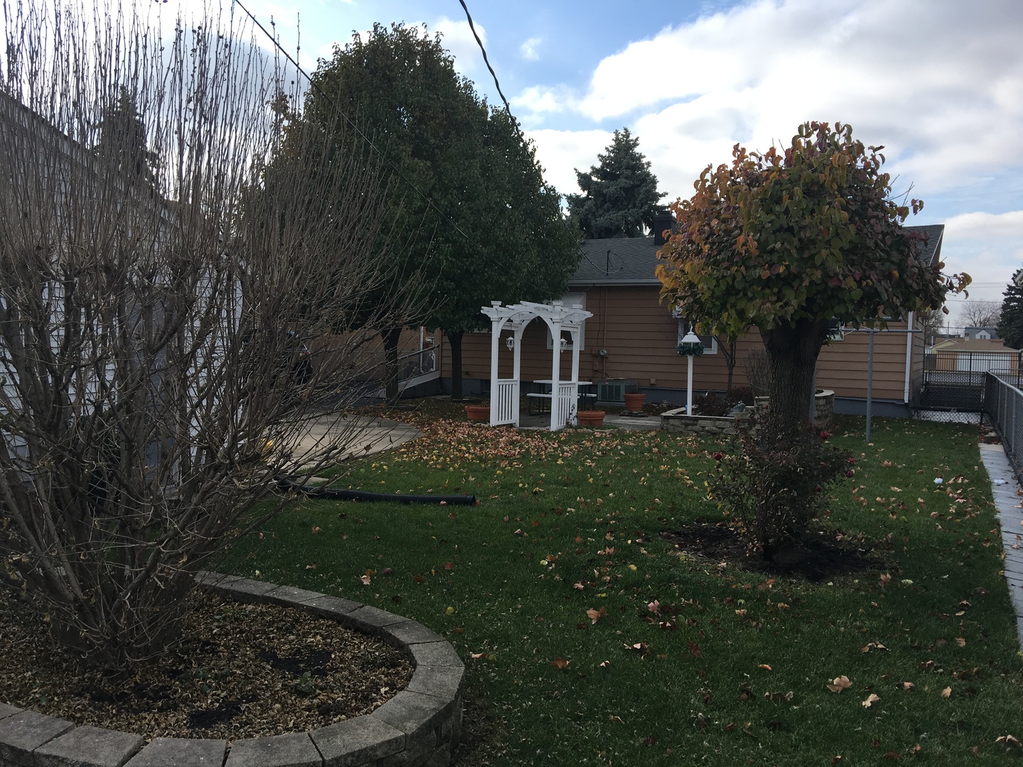 4919 Long Avenue Chicago, IL 60638 - Photo 7 of 29 a view of a house with a yard