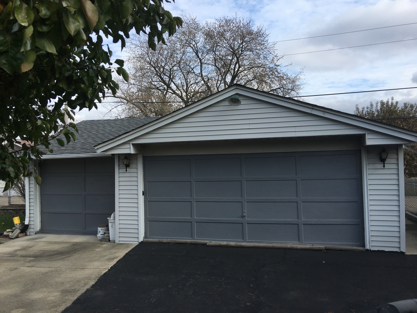 4919 Long Avenue Chicago, IL 60638 - Photo 9 of 29 a front view of a house with a garage