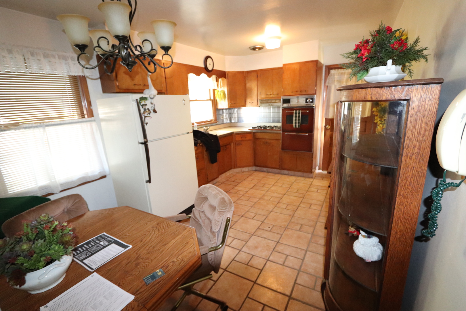 4919 Long Avenue Chicago, IL 60638 - Photo 10 of 29 a kitchen with a refrigerator and a sink
