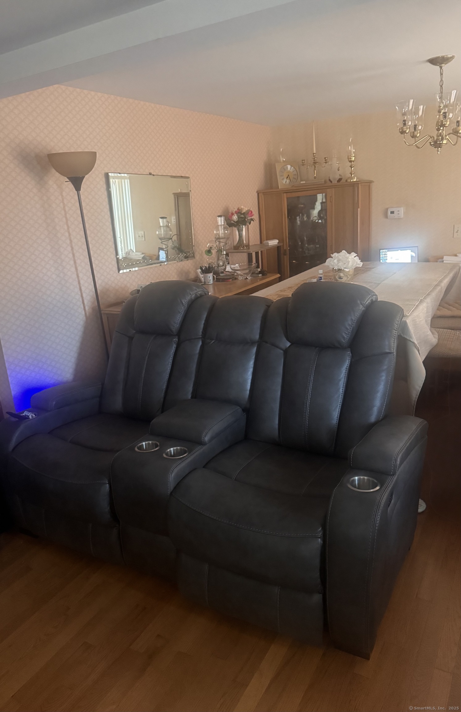 222 1/2 North State Street Ansonia, CT 06401 - Photo 3 of 14 a living room with furniture and a mirror