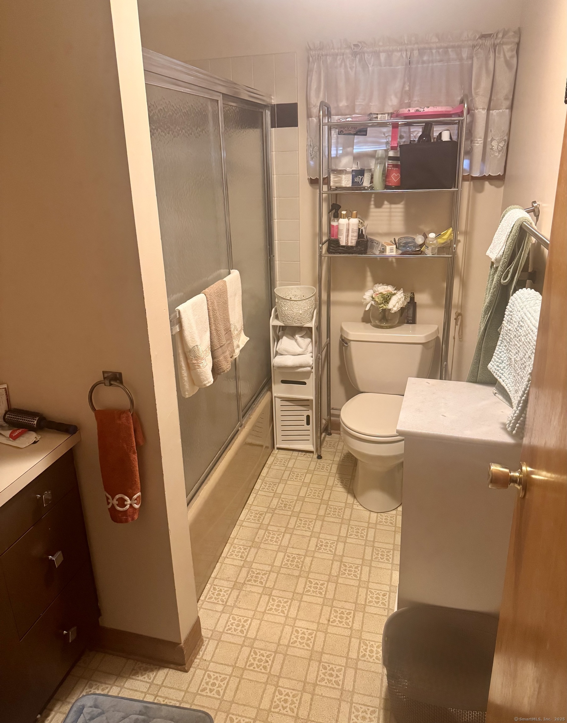 222 1/2 North State Street Ansonia, CT 06401 - Photo 6 of 14 a bathroom with a sink toilet and shower