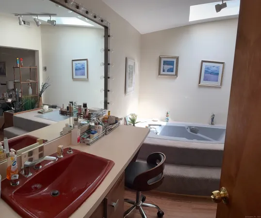 a view of a workspace with furniture