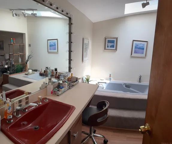 a view of a workspace with furniture