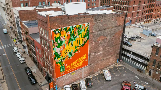 an aerial view of a building with street