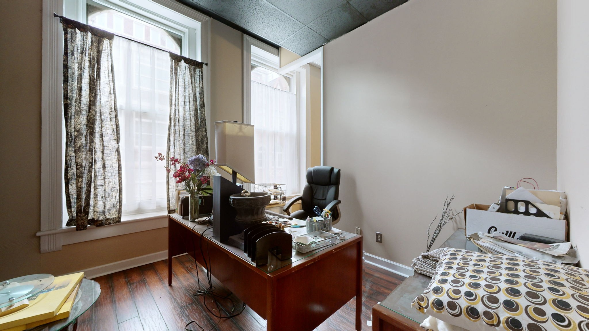 208 3rd Avenue North, Unit 400 Nashville, TN 37201 - Photo 12 of 40 a living room with furniture and a window