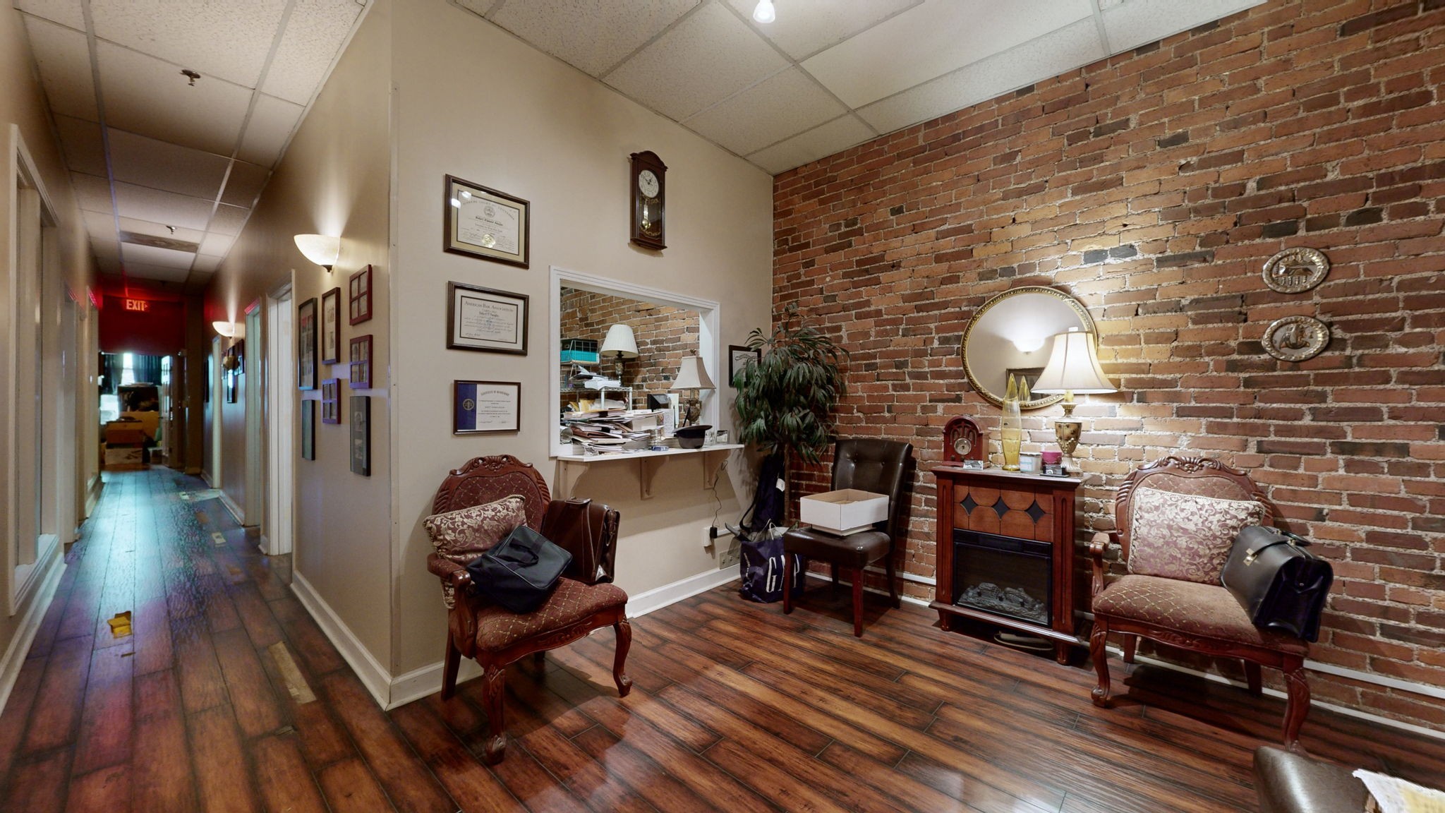 208 3rd Avenue North, Unit 400 Nashville, TN 37201 - Photo 8 of 40 a view of a livingroom with furniture and a fireplace