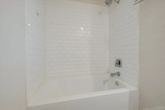 a bathroom with a bathtub