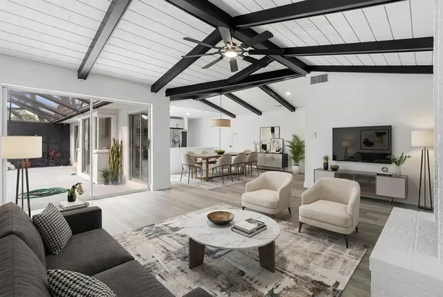 a kitchen with a table and chairs in it