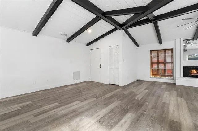 a kitchen with stainless steel appliances a sink stove and refrigerator