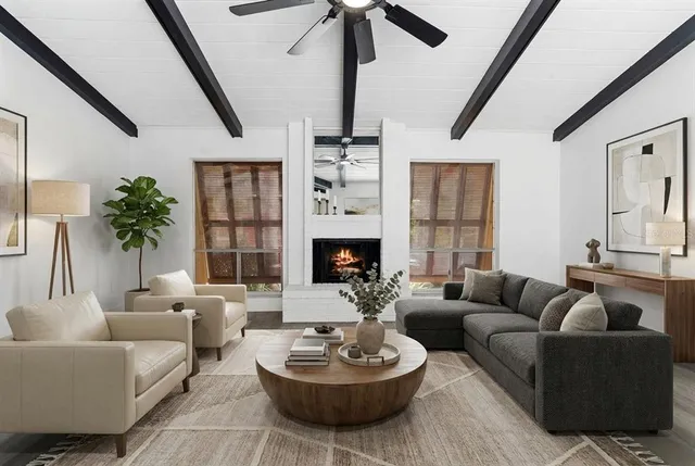 a view of a kitchen with wooden floor and a kitchen