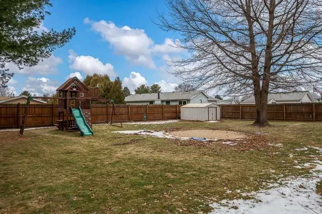 a view of a house with a park