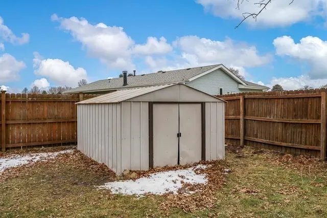 a view of a yard with a tree