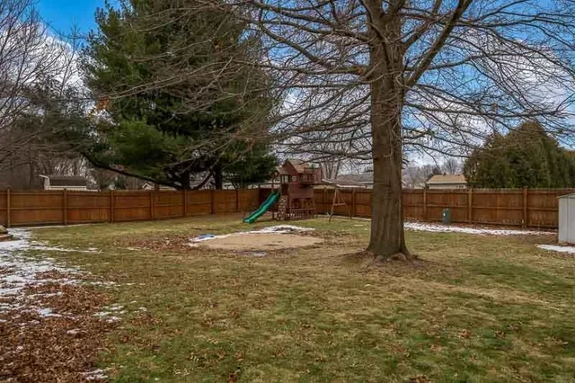 a view of house with backyard porch and furniture