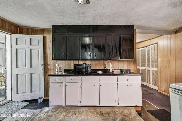 a view of a yard with an outdoor space and seating area