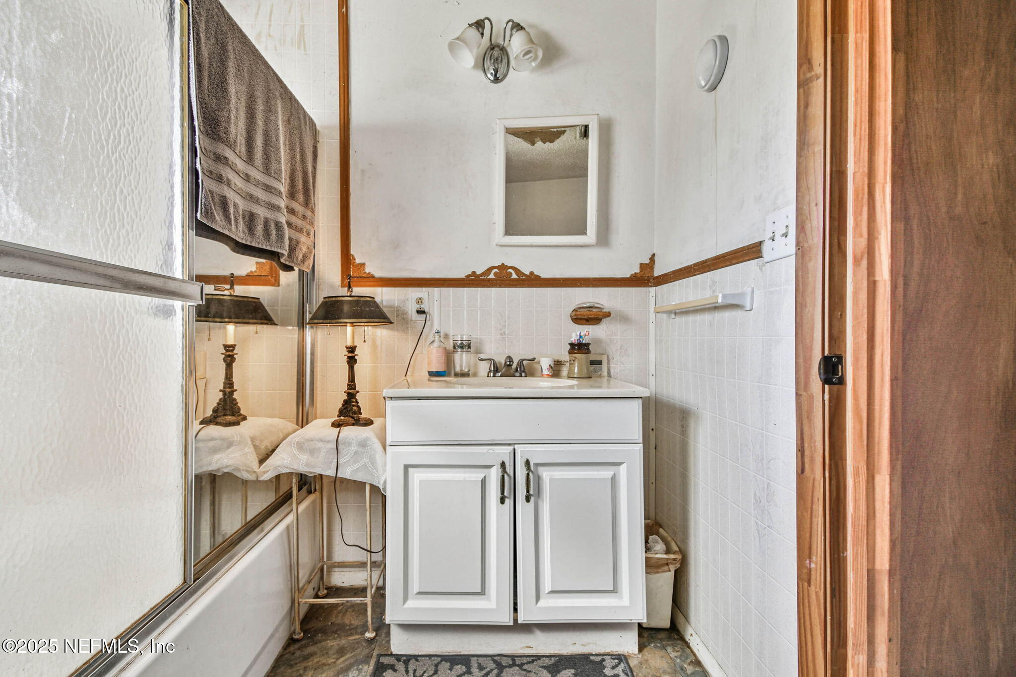 309 Hatten Lane Hastings, FL 32145 - Photo 27 of 28 a view of a hallway with washer and dryer