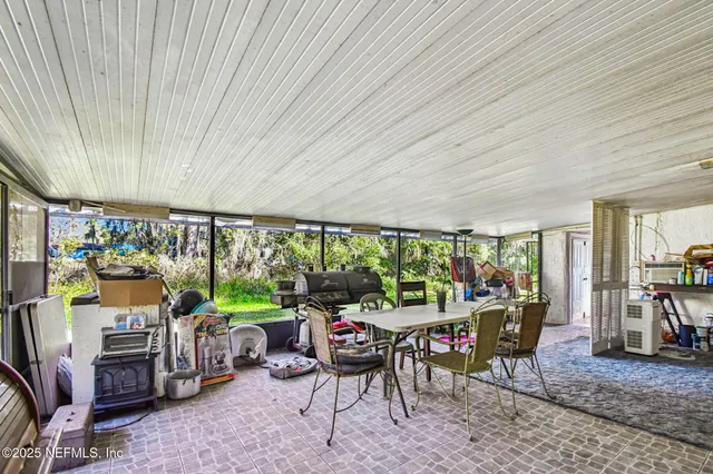 a kitchen with stainless steel appliances a stove refrigerator sink and cabinets