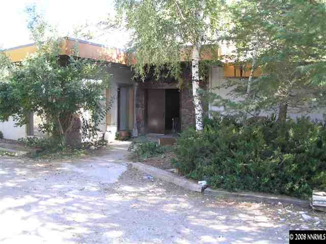 2155 Piute Creek Road Reno, NV 89510 - Photo 1 of 8 a view of a yard with plants and trees