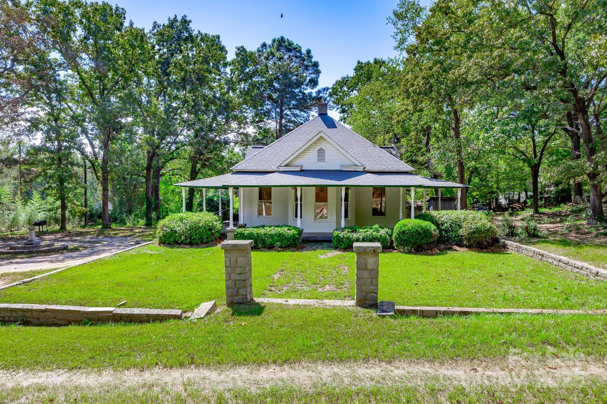 2086 State Rd S-20-19 Winnsboro, SC 29180 - Photo 2 of 30 a front view of a house with a yard