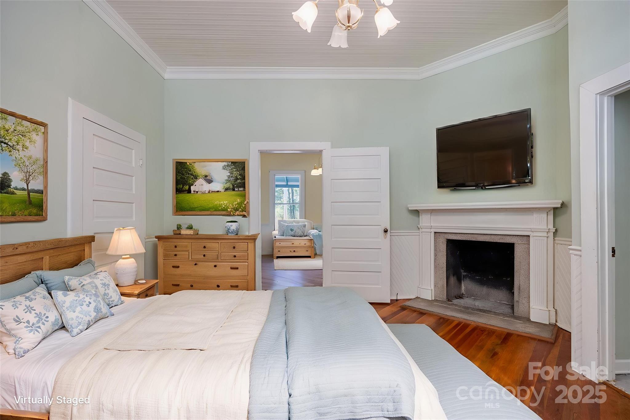 2086 State Rd S-20-19 Winnsboro, SC 29180 - Photo 23 of 30 a bedroom with a bed and a flat screen tv