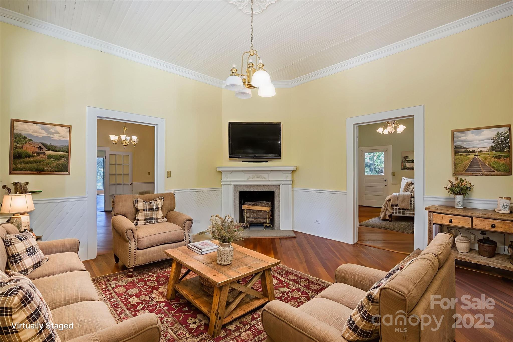 2086 State Rd S-20-19 Winnsboro, SC 29180 - Photo 9 of 30 a living room with furniture a fireplace and a flat screen tv
