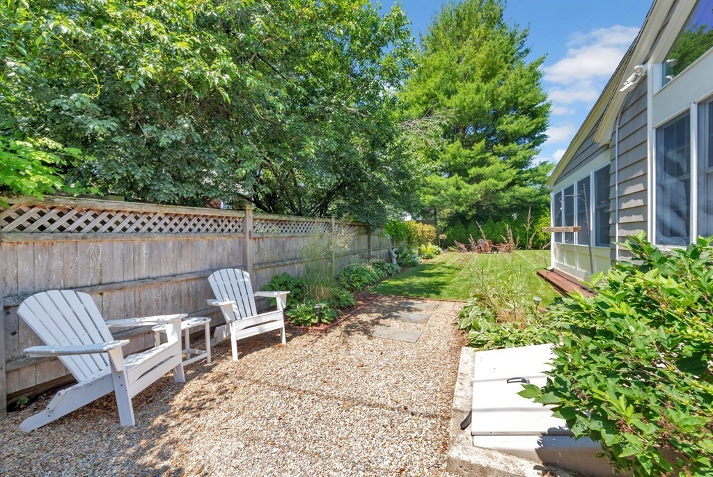 23 Leicester Road Marblehead, MA 01945 - Photo 4 of 42 a view of backyard with outdoor seating and green space