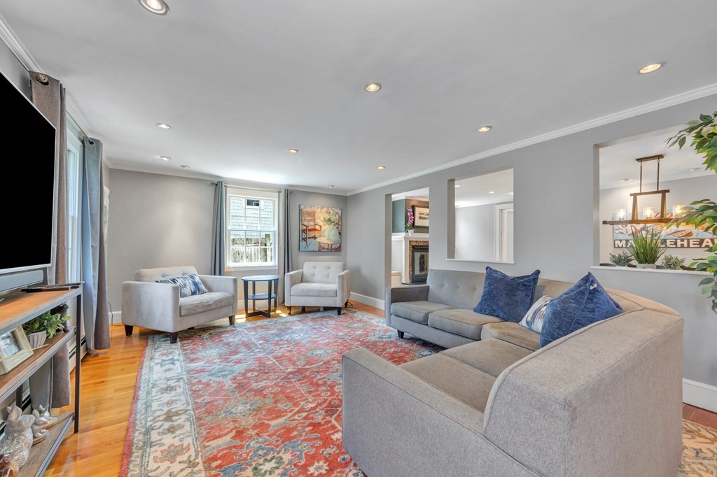 23 Leicester Road Marblehead, MA 01945 - Photo 8 of 42 a living room with furniture and a flat screen tv