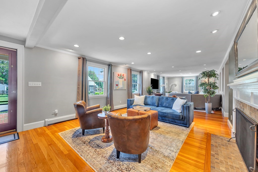 23 Leicester Road Marblehead, MA 01945 - Photo 10 of 42 a living room with furniture a rug and a chandelier