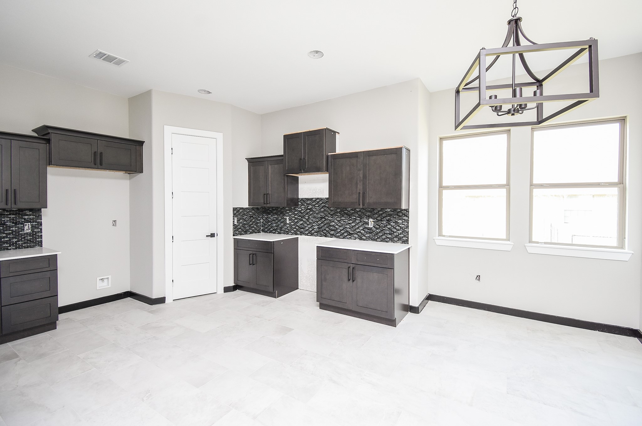 208 Silverleaf Road Sweeny, TX 77480 - Photo 18 of 49 a kitchen with a refrigerator and window